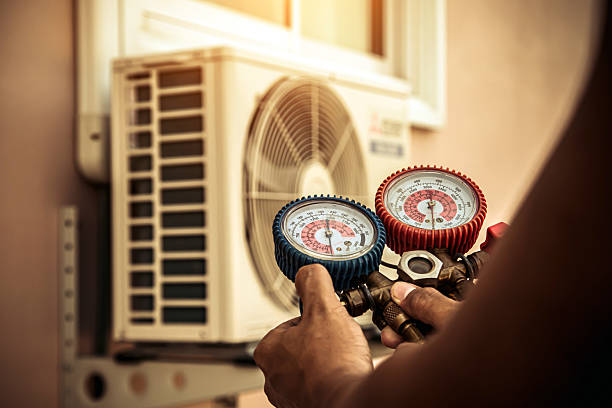 Professional Air Conditioning Service technician working in Indian Head, MD